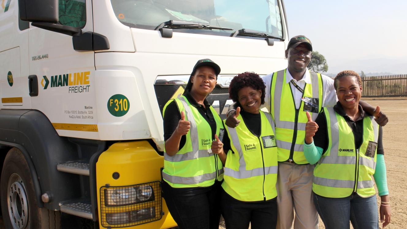 Determined to make their mark in the trucking world are (from left) Nonhlanhla Ngubane, Lindiwe Myakayaka and Patricia Mbambo, supported by their driver trainer, Nduna Chari.