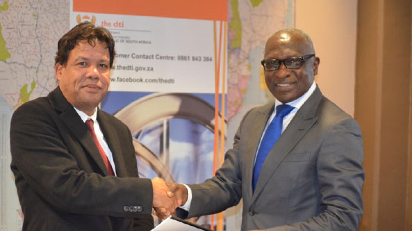 Director general of the dti, Lionel October (left), and the UNDP resident representative in South Africa, Gana Fofang. 
