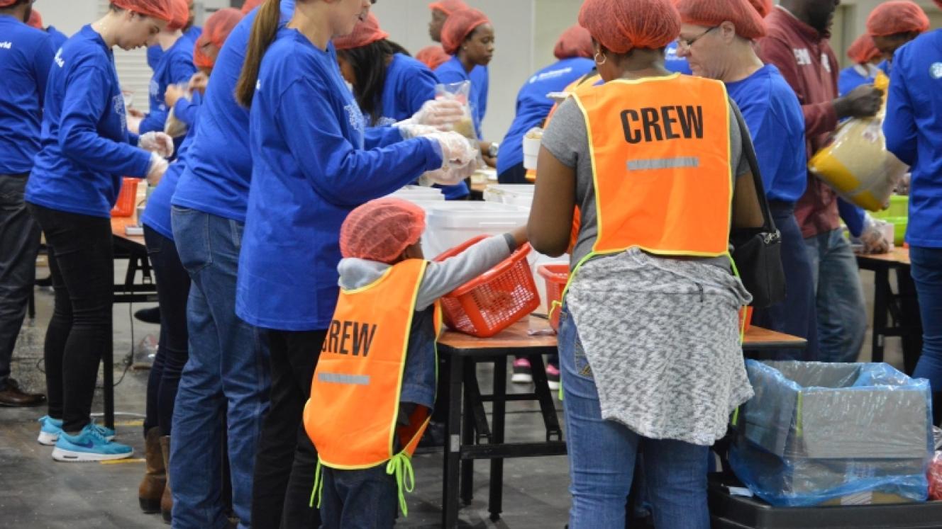 Barloworld Logistics teams were tasked with packing food during the Rise Against Hunger event.