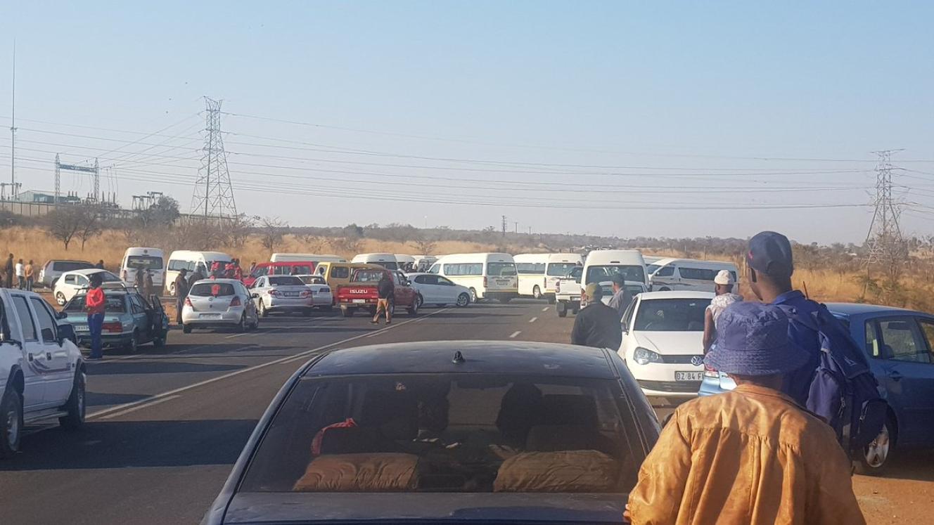 Taxis blocking a road in Soshanguve.