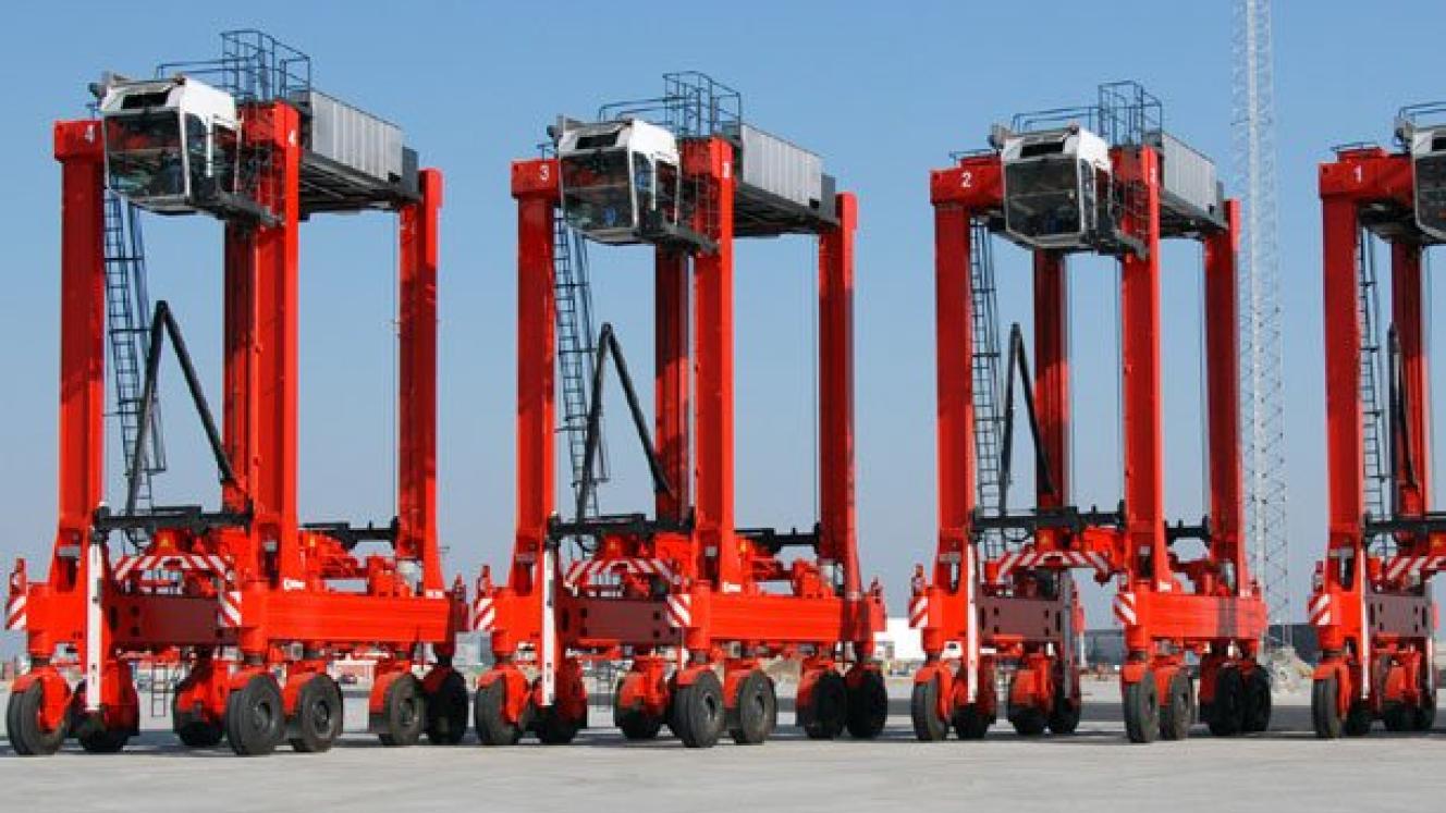 Some Kalmar straddle carriers.