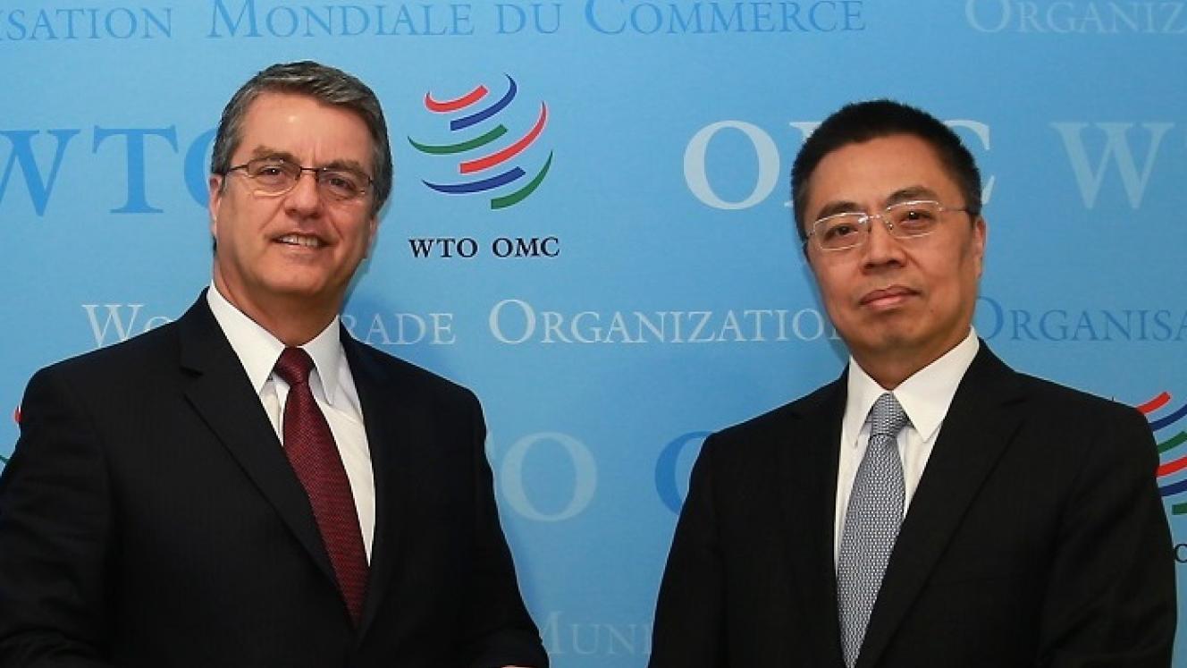 WTO director-general Roberto Azevêdo and Chinese ambassador, Zhang Xiangchen.