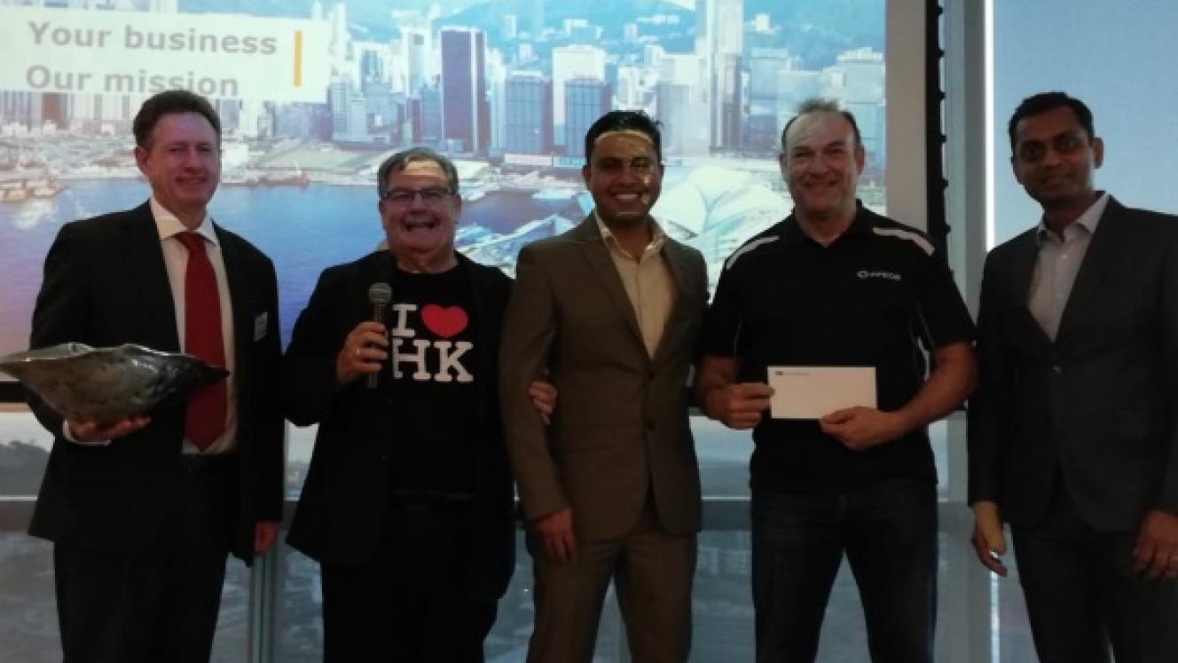 Bernard Henning of the PPECB receives his two return tickets from Leandi Beling and Avik Kapoor of Cathay Pacific, with Conrad Hendry of HKTDC and Terry Gale of ECWC looking on.