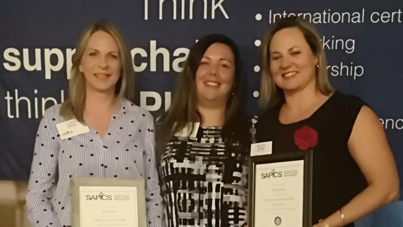 Metro Minds accepting both awards 