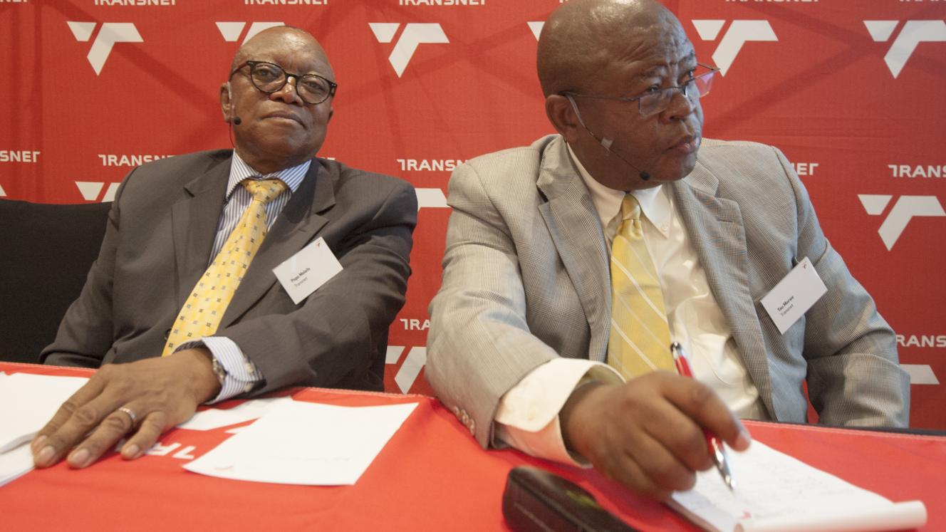 Better days… Transnet board chairman Popo Molefe and outgoing CEO Tau Morwe before the latter learned that his contract would not be extended.