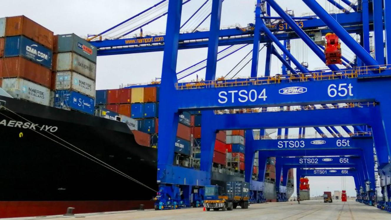 Walvis Bay’s gantries line up next to the Maersk Iyo for a ship-to-shore first for Namibia’s new container terminal.