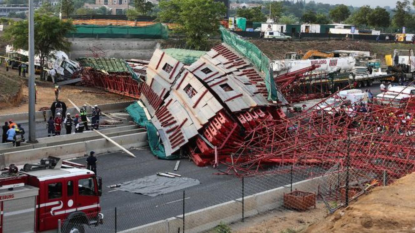 Rescue workers on the scene of the M1 bridge collapse earlier this month.