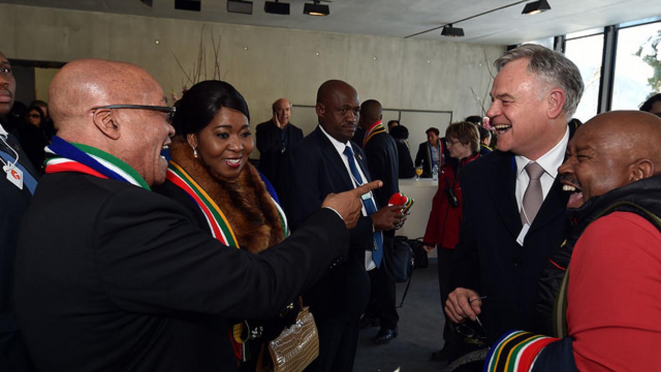 President Jacob Zuma and Bongi Ngema Zuma share a light moment with businessmen Koos Bekker and Jabu Mabuza at the World Economic Forum (WEF). 