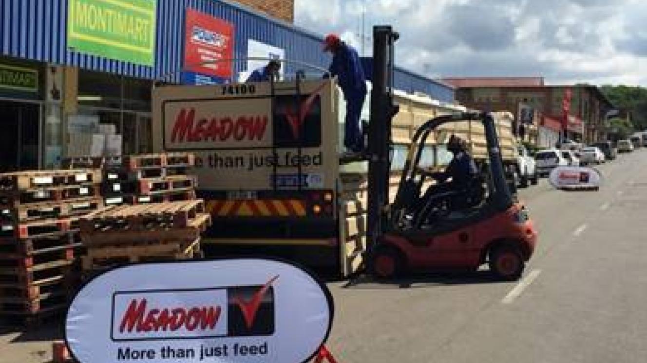 Meadow Feeds employees preparing the delivery of water and drought feed to be delivered in Pomfret.