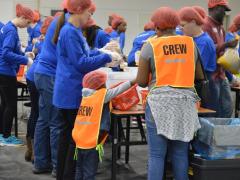 Barloworld Logistics teams were tasked with packing food during the Rise Against Hunger event.