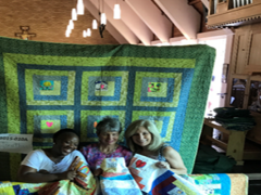 From the left: Lwazi Mofokeng from DIRCO, Gretchen Ginnerty, president of the Love Quilt Project (LQP) and Diana Higgs, SA coordinator of the LQP.