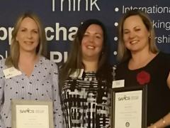 Metro Minds accepting both awards 