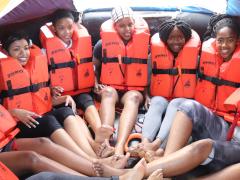 Maritime students, from left, Erenique Solomon, Masibulele Rixana, Izandry Mabotja, Siyamthanda Faliso and Mihlali Mfana practise the correct position for sitting in a life raft. 