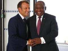 French President Emmanuel Macron welcomes South African President Cyril Ramaphosa in Biarritz on Sunday.