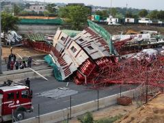 Rescue workers on the scene of the M1 bridge collapse earlier this month.