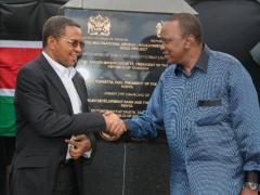 Kenyan president Uhuru Kenyatta (left) and Tanzania’s president Jakaya Kikwete jointly unveiled a commemorative plaque during the official launch of the Arusha-Holili/Taveta-Mwatate road.