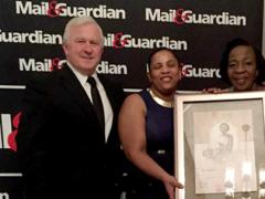 Pictured with the award (from left) … Dr Iain Barton; sister Siza Nkosi (Tembisa Clinic); sister Nomsa Zazakoywe (Villa Lisa Clinic); and Lynda Toussaint (Unjani Clinics).