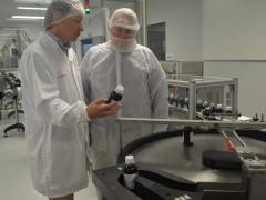 Dr Rob Davies, pictured at the Johnson & Johnson Cape Town plant with the company’s site leader, Alex Granados.