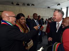 President Jacob Zuma and Bongi Ngema Zuma share a light moment with businessmen Koos Bekker and Jabu Mabuza at the World Economic Forum (WEF). 