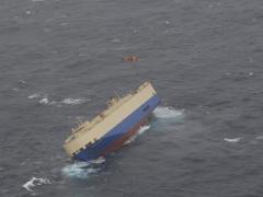 The Modern Express on her side and abandoned in the Bay of Biscay. Photo credit: Salvamento MaritimoThe Modern Express on her side and abandoned in the Bay of Biscay. Photo credit: Salvamento Maritimo