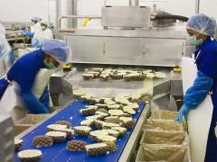 Factory workers sort Island Way Sorbet – one of the products created at thDynamic Commodities facility at the Coega IDZ.