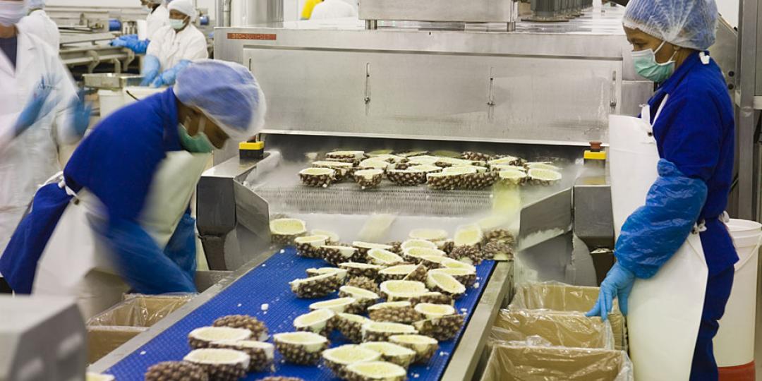 Factory workers sort Island Way Sorbet – one of the products created at thDynamic Commodities facility at the Coega IDZ.