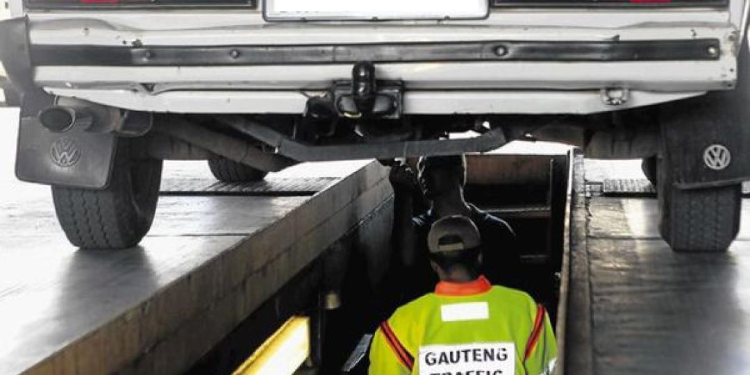 Gauteng Traffic Police examine a learner transport vehicle.