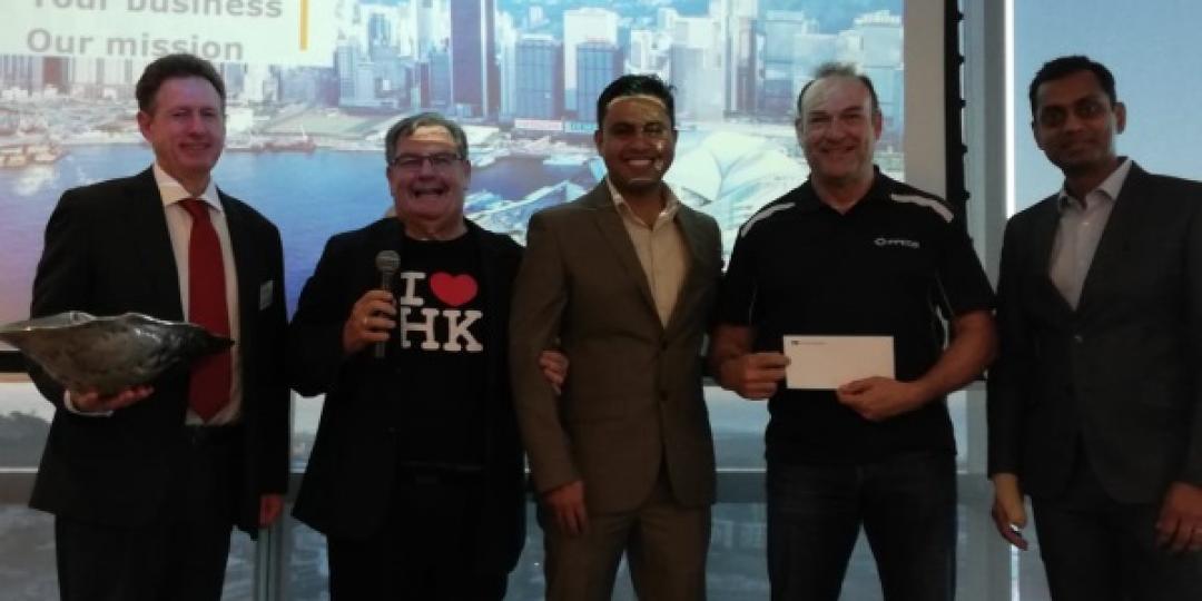 Bernard Henning of the PPECB receives his two return tickets from Leandi Beling and Avik Kapoor of Cathay Pacific, with Conrad Hendry of HKTDC and Terry Gale of ECWC looking on.